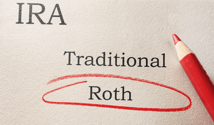 Image of a paper with the text "IRA Traditional Roth" written on it. The word "Roth" is circled in red with a red pen.